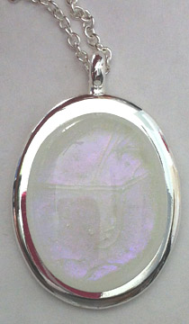 A larger photo of the Clear Glass with a Hint of Pink on White Oval in Silver-plated Setting