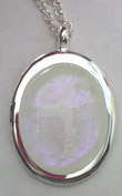 Click for a larger photo of the Clear Glass with a Hint of Pink on White Oval in Silver-plated Setting