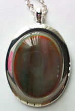 Click for a larger photo of the Multicolored Brown & Orange Swirl Oval in Silver-plated Setting
