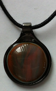 A larger photo of the Multicolored Brown & Orange Swirl Round in Gunmetal-plated Setting