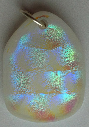 Click for a larger photo of the Clear Honeycomb Patterned Glass on White Shield Shaped Necklace