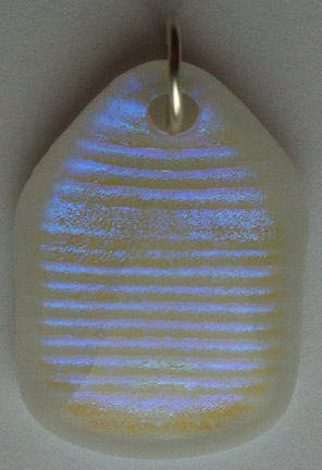 Click for a larger photo of the Clear Multicolor Ribbed Glass on White Shield Shaped Necklace