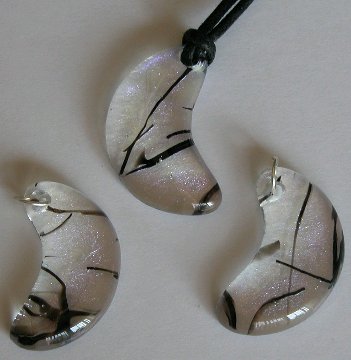 Click for a larger photo of the Clear and Violet Black Stringer Glass Moon Necklace