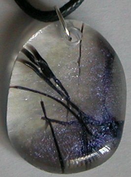 Click for a larger photo of the Clear and Violet Black Stringer Glass Shield Shaped Necklace