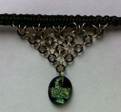A larger photo of the Clear Glass on Blue, Green & Gold Splatter Patterned Oval Shaped Chain Maille Choker