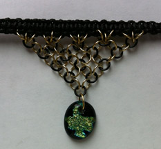 Click for a larger photo of the Clear Glass on Blue, Green & Gold Splatter Patterned Oval Shaped Chain Maille Choker