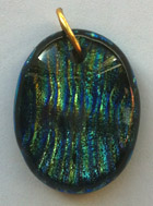 Click for a larger photo of the Clear Glass on Blue & Gold Vertical Rib Patterned Glass Oval Shaped Necklace