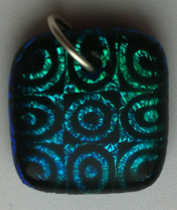 Click for a larger photo of the Clear Glass on Blue Green Bullseye Patterned Pendant