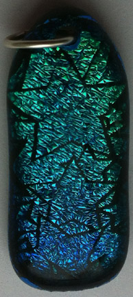 Click for a larger photo of the Clear Glass on Blue Green Star Patterned Longer Shield Shaped Necklace