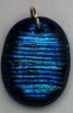 Click for a larger photo of the Clear Glass on Blue Horizontal Rib Patterned Oval Shaped Necklace