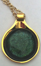 Click for a larger photo of the Clear Glass on Iridescent Green Round in Gold-plated Setting