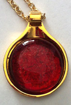 Click for a larger photo of the Clear Glass on Iridescent Red Round in Gold-plated Setting