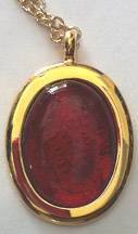 Click for a larger photo of the Clear Glass on Iridescent Red Oval in Gold-plated Setting