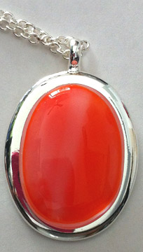 A larger photo of the Coral Glass Oval in Silver-plated Setting