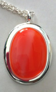 Click for a larger photo of the Coral Glass Oval in Silver-plated Setting