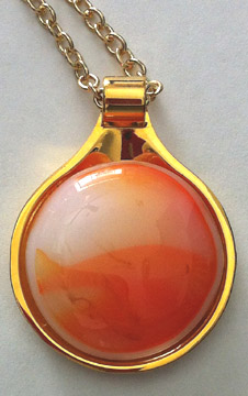 A larger photo of the Coral Glass Round in Gold-plated Setting