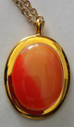 Click for a larger photo of the Coral Glass Oval in Gold-plated Setting