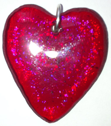 A larger photo of the Clear Glass on Iridescent Red Heart Shaped Necklace