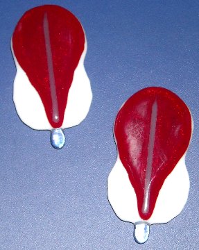 A larger photo of the Macaw Glass Feather Magnets