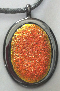 A larger photo of the Textured Orange Krinkle Oval in Gunmetal-plated Setting