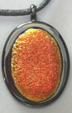 Click for a larger photo of the Textured Orange Krinkle Oval in Gunmetal-plated Setting