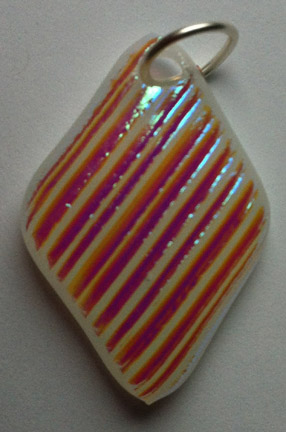 Click for a larger photo of the Textured Multicolor Ribbed Glass on White Diamond Shaped Necklace