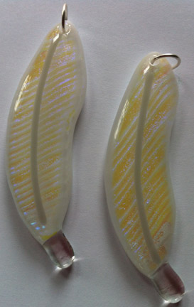 A larger photo of the Clear Glass with Yellow/Violet/Blue Dichroic Glass on White Glass Feather Necklace